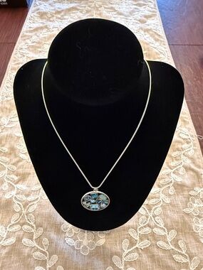 Touchstone Crystal Silver Necklace with Blue Multi-Stone Oval Pendant